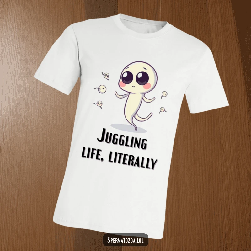 Funny sperm cell t-shirt with googly eyes juggling tiny sperm cells by its tail, boldly displaying quirky science humor.